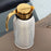 Diana Carafe with Leather Cover <br> Shiny Gold / Cream <br> 1.5 Liters